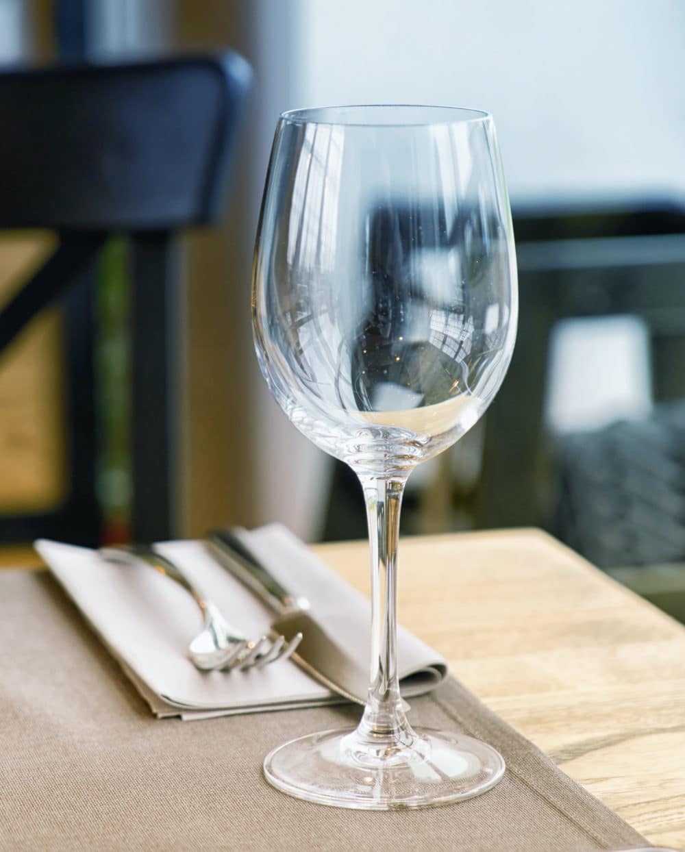 glass on table at restaurant financial planning